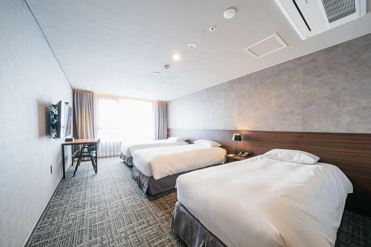 With City Hotel Jeju Exterior foto